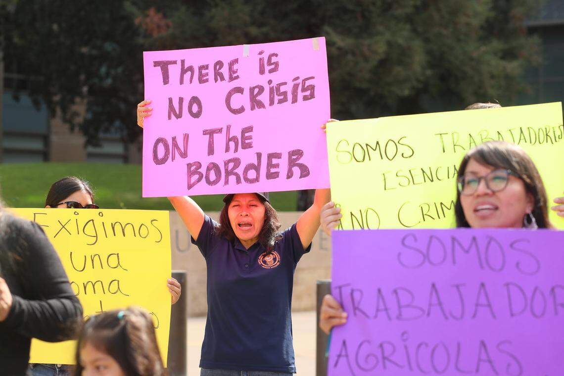 The May 1st Coalition, a broad coalition of community-based organizations and residents, urges the immigrant community to protect themselves against immigration crackdown during a press conference outside of the Robert E. Coyle United States Courthouse, in downtown Fresno on Oct. 1, 2025.