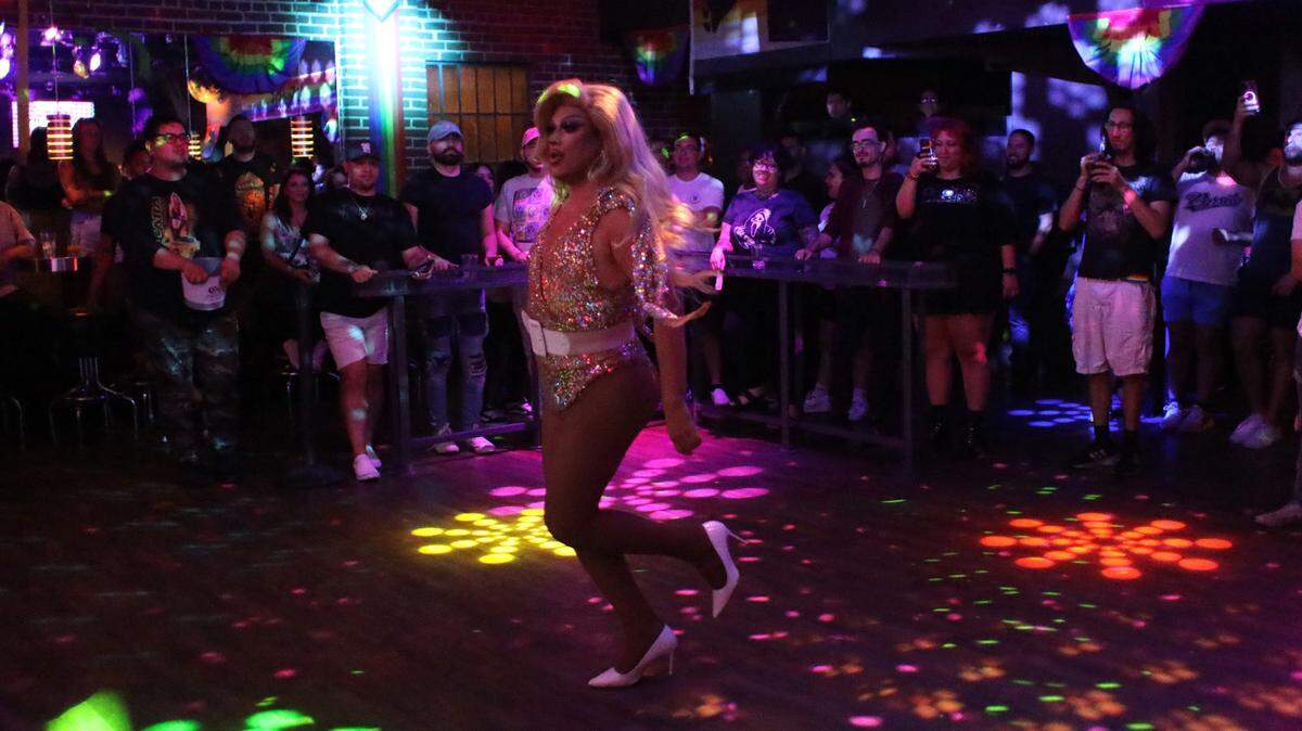 Drag queen performer Cara Coronado performs at the Splash nightclub in the Tower District on Aug. 10, 2023.
