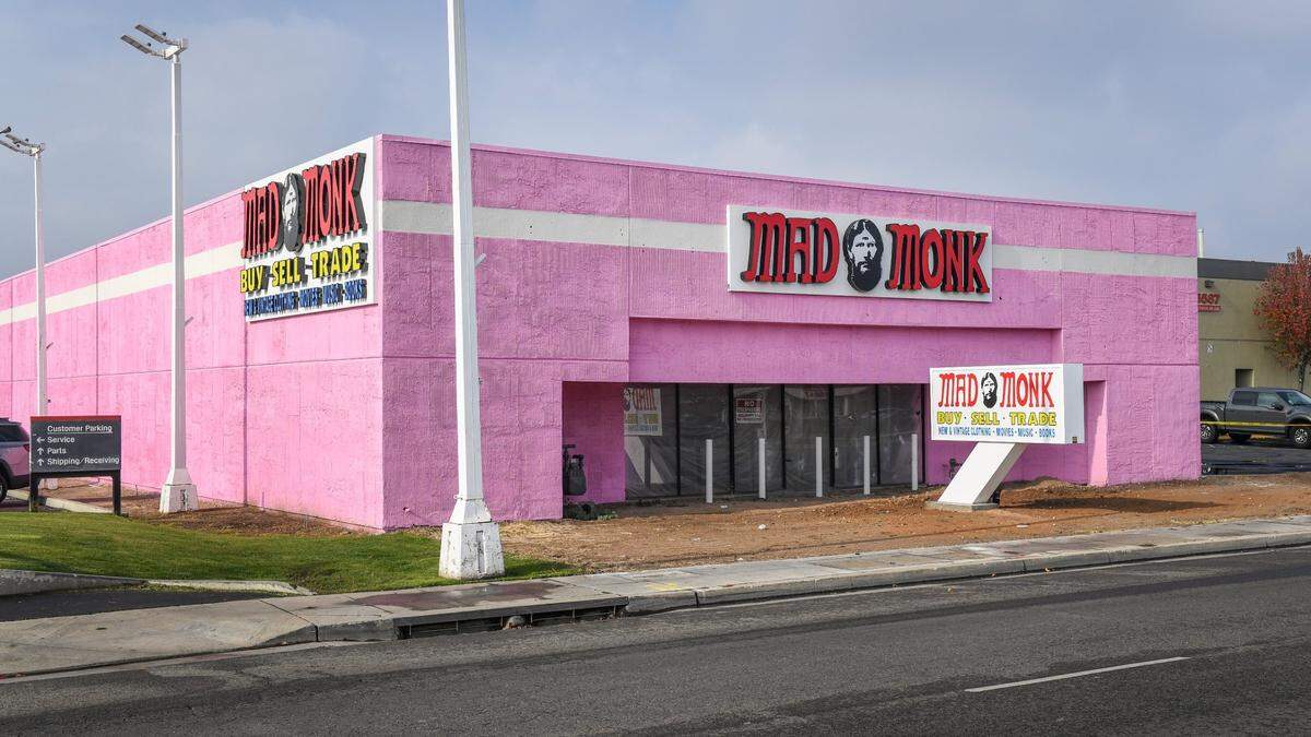 The giant pink building on Blackstone Avenue south of Bullard Avenue is Mad Monk, a store by the owner of Rasputin Music. It’s partially open, selling used books, movies and music, pictured in this file photo from December, 2020.