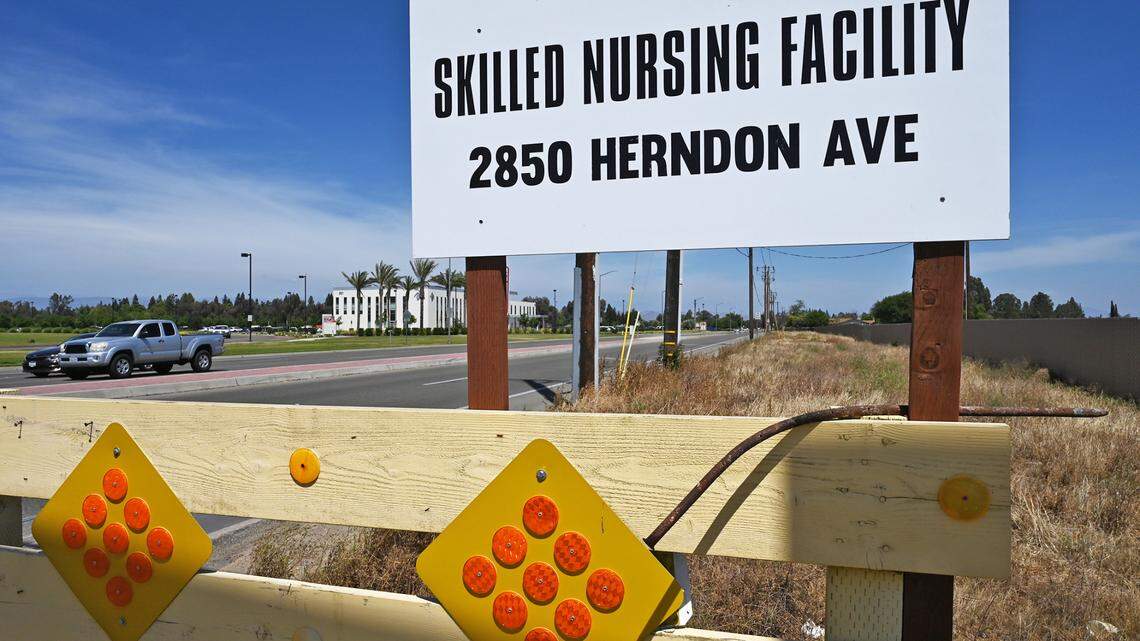 A sign along Herndon Ave just across the street from Clovis Community Medical Center marks the location of the planned skilled nursing facility. Photographed Thursday, May 19, 2022 in Clovis.