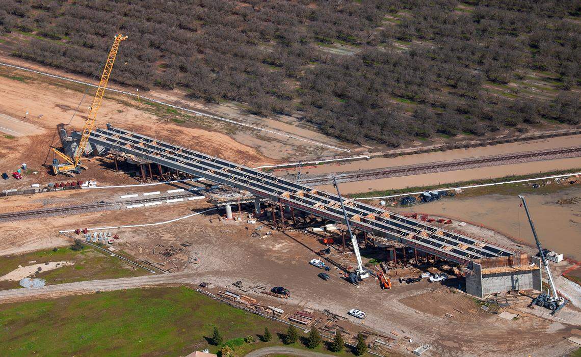 An aerial photo from Feburary 2019 shows the four concrete girders spanning 637 feet to support the road deck of the Road 27 overpass above the existing BNSF Railway tracks and future high-speed rail line north of Madera.