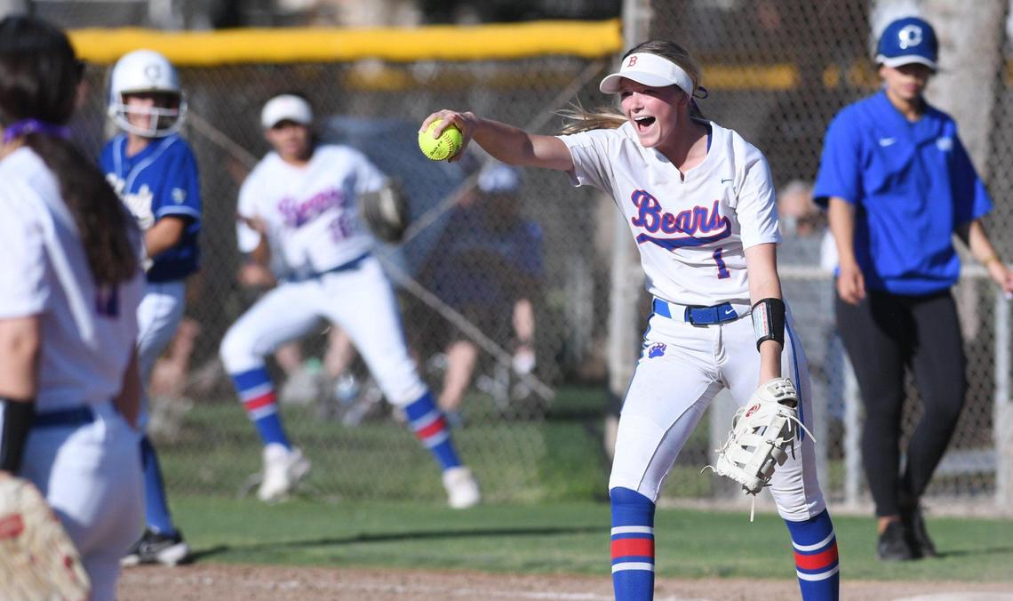 Buchanan’s Lily Gengozian, right, cheers after she makes the play at first base in the Central Section Division I semifinal game Tuesday, May 24, 2022 in Clovis.