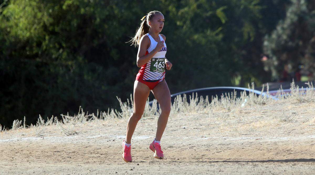 Buchanan High sophomore Molly Sundgren placed 11th overall (17:44.1) in the Bill Buettner race of the 2024 Asics Clovis Cross Country Invitational at Woodward Park on Oct. 12, 2024. Buchanan won the team title with 65 points, ahead of runnerup JSerra Catholic.