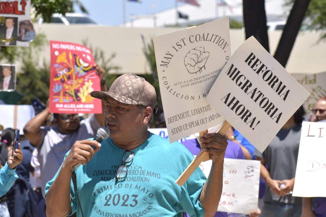 Loenel Flores, coordinator for the May Day Coalition for Immigrants’ Rights Fresno, speaks out against aggressive federal immigration enforcement to a crowd of protestors in downtown Fresno on Monday.