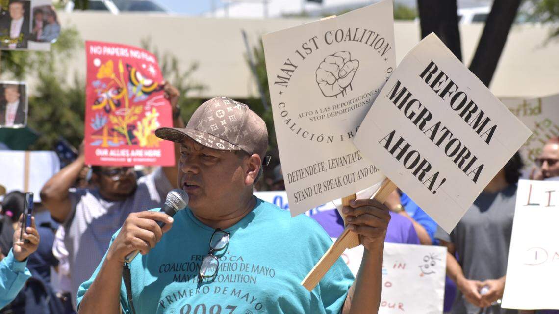 Loenel Flores, coordinator for the May Day Coalition for Immigrants’ Rights Fresno, speaks out against aggressive federal immigration enforcement to a crowd of protestors in downtown Fresno on Monday, June 9, 2025.