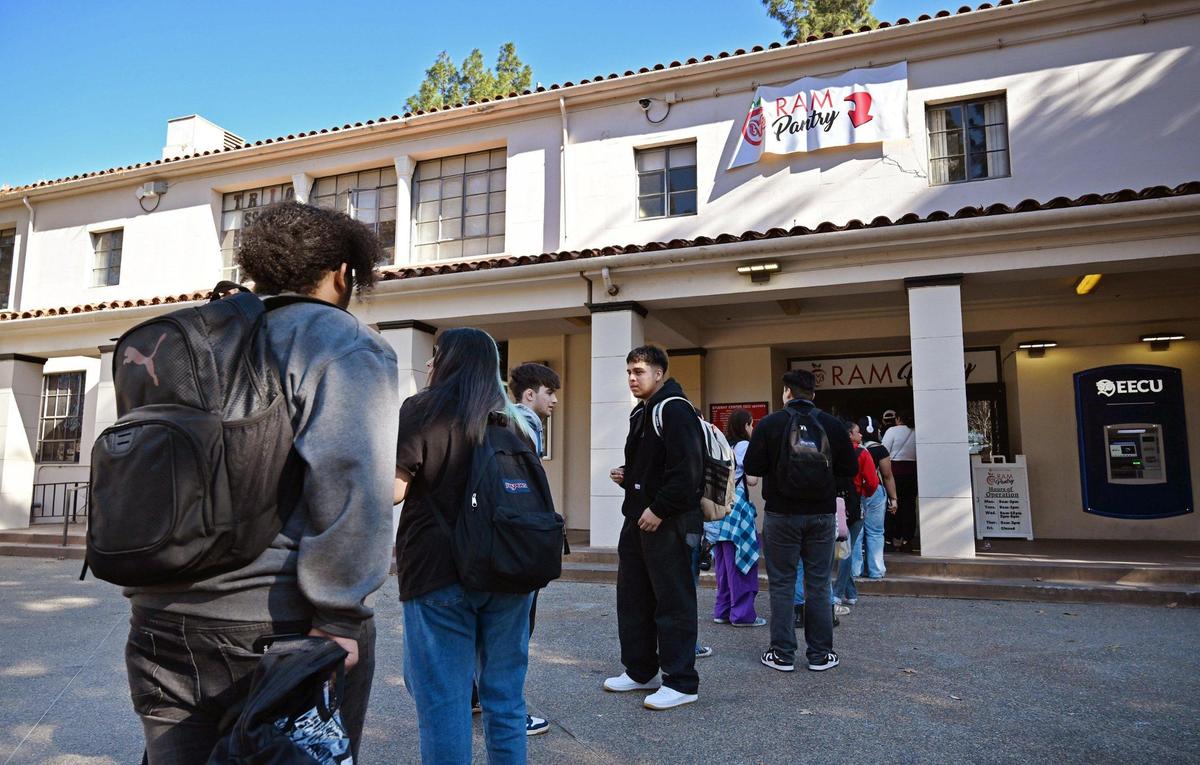 Students stand in line for the Ram Pantry at Fresno City College Monday, Jan. 13, 2025 in Fresno. Ram Pantry is a free food assistance program for students currently enrolled at Fresno City College.