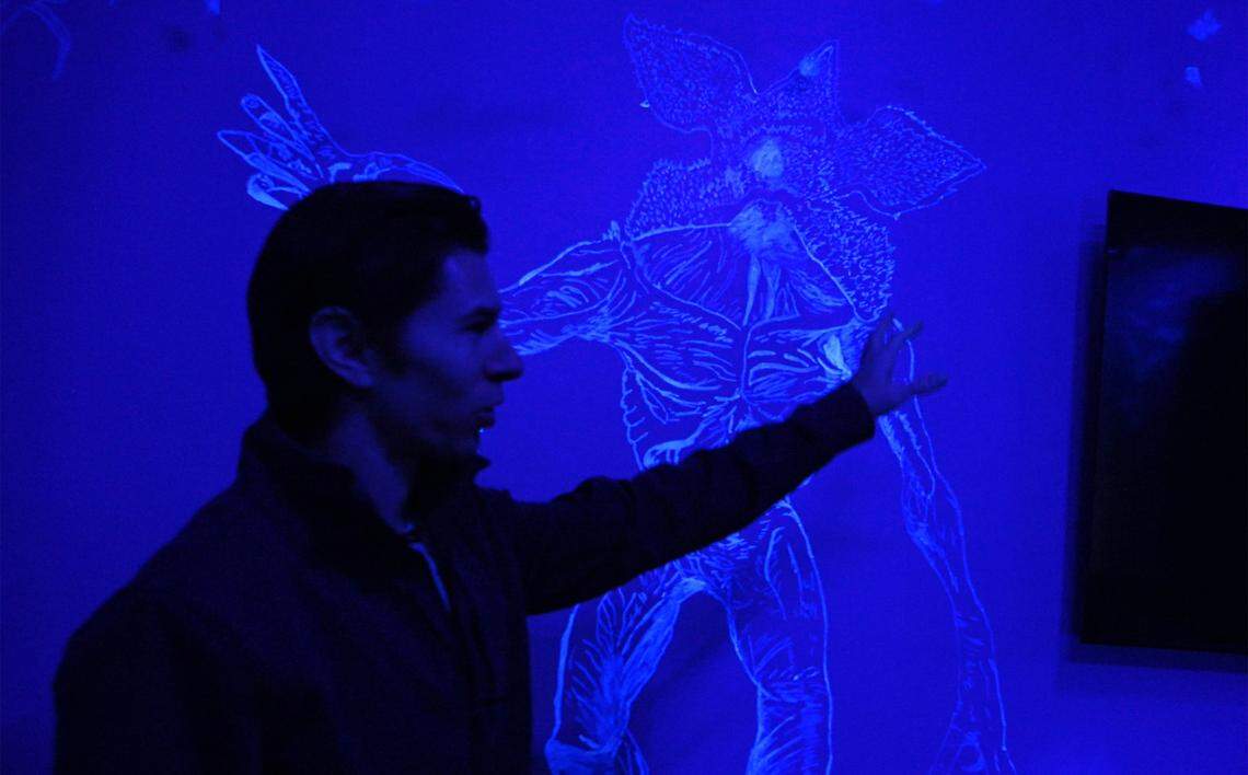 A glow-in-the-dark Demogorgon is revealed in a bedroom at this Airbnb house in Clovis. Photographed Tuesday, Jan. 13, 2026 in Clovis.