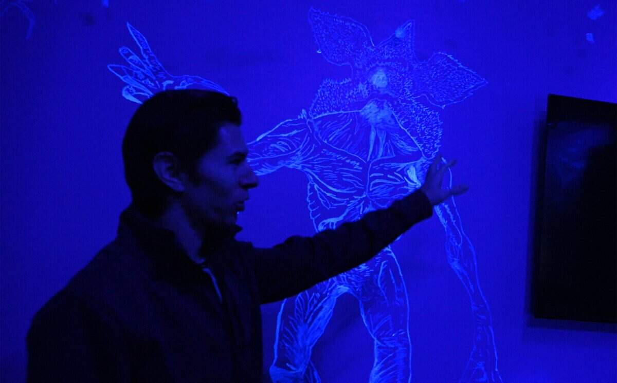 A glow-in-the-dark Demogorgon is revealed in a bedroom at this Airbnb house in Clovis. Photographed Tuesday, Jan. 13, 2026 in Clovis.