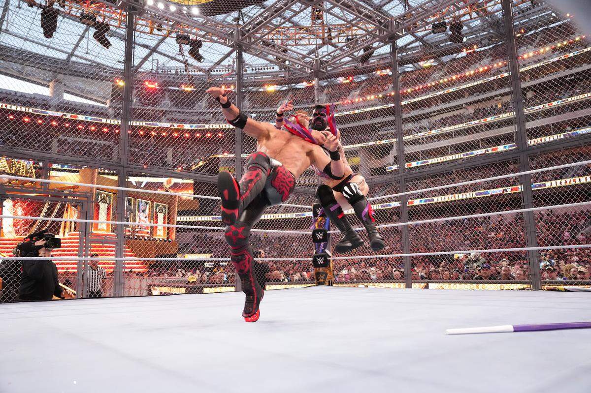 Edge and Finn Balor meet in the Hell in the Cell match at WrestleMania 39 from SoFi Stadium in Inglewood, California.