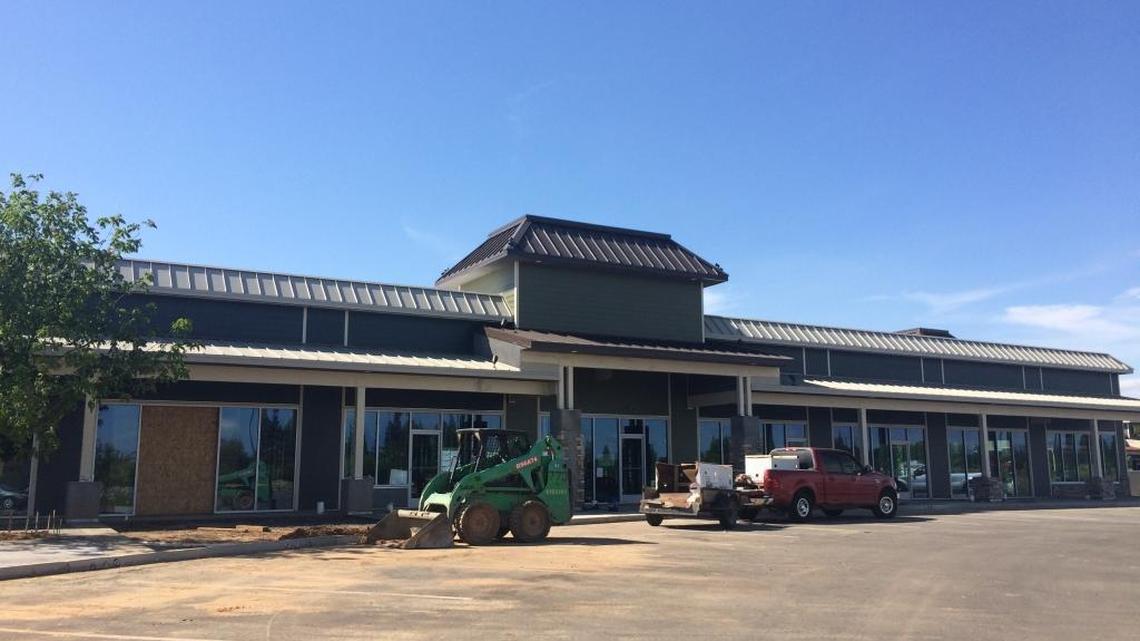Construction of buildings like this one is underway at Park Crossing, the new development at Friant Road and Fresno Street, and the future home of Trader Joe’s. Construction on Trader Joe’s building has not started yet. The Blackstone Avenue store will close and reopen in the new spot in the second half of 2017.