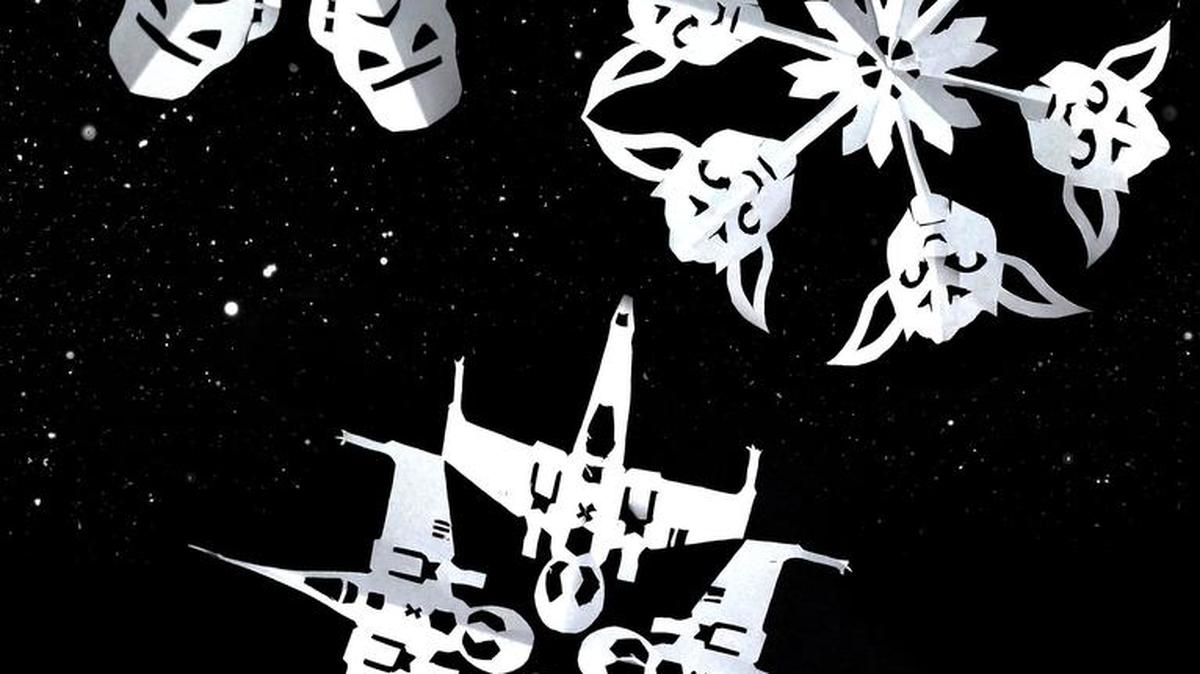 Star Wars snowflakes: Stormtrooper, Yoda and an X-Wing fighter snowflakes. Templates are free to download from graphic designer Anthony Herrera's website www.anthonyherreradesigns.com