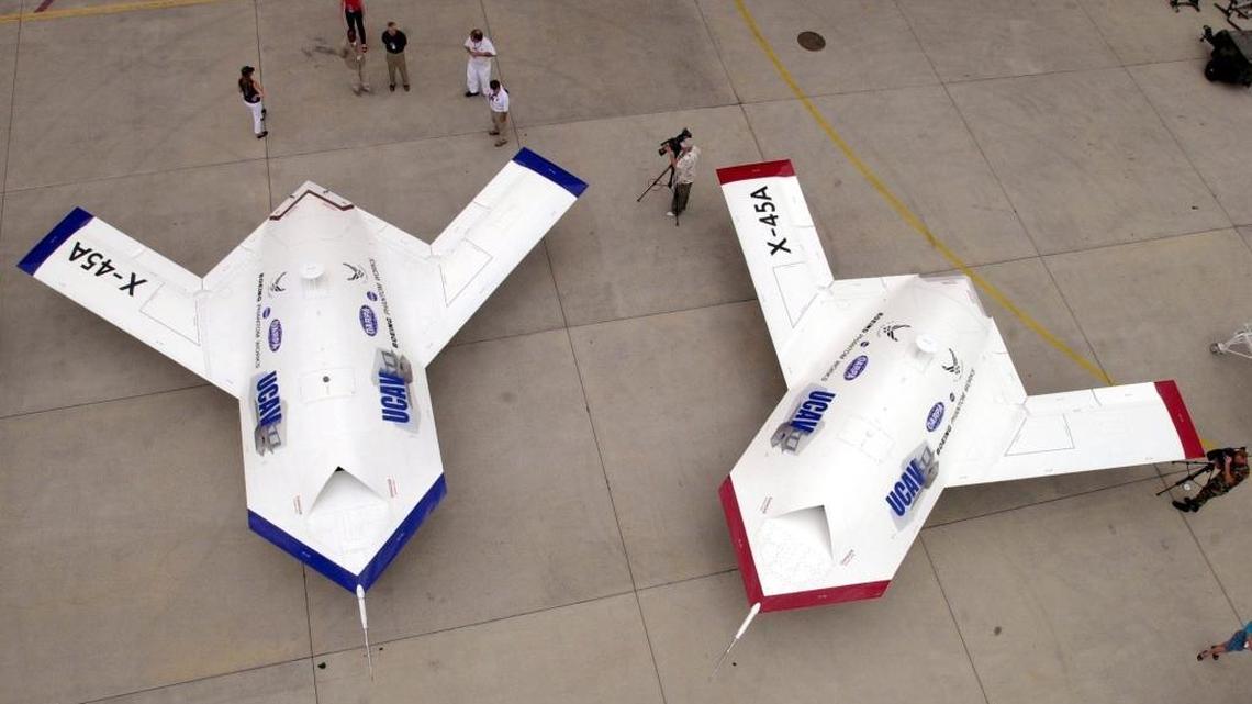 
This 2002 file photo shows two Boeing X-45 unmanned combat air vehicles at Edwards Air Force Base. The X-45 was designed to fly autonomously and carry 3,000 pounds of weapons into combat. Some scholars and tech experts have called for a ban on autonomous weapons. 
