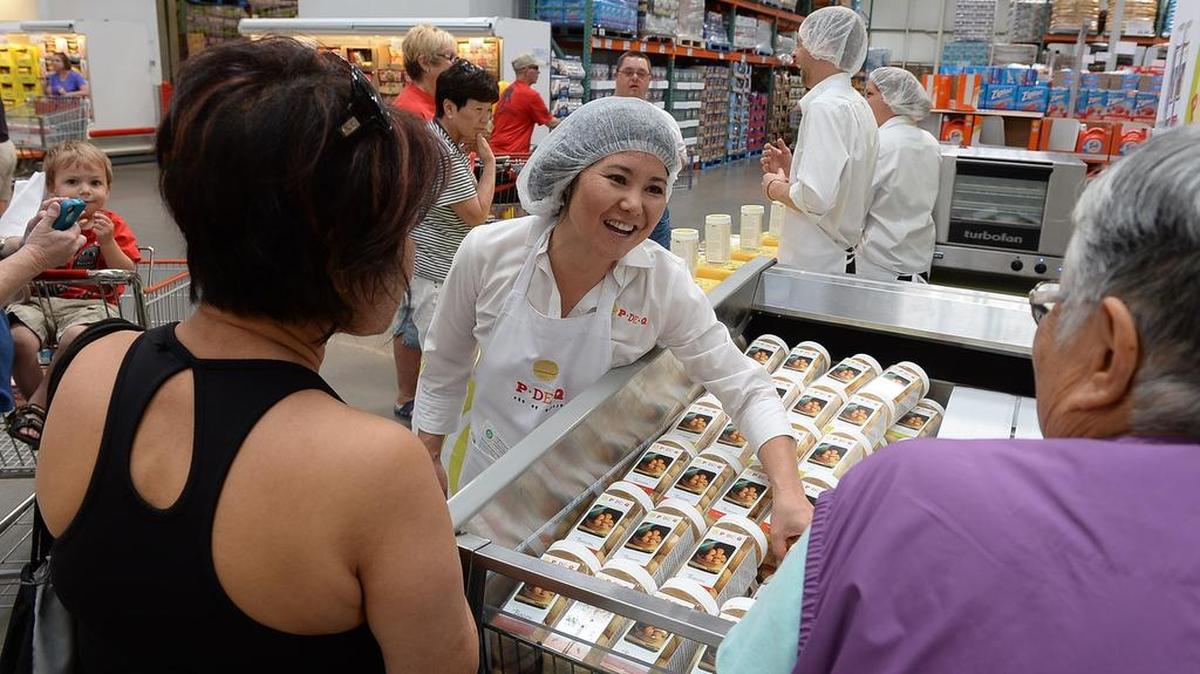 
P*DE*Q owner Flavia Takahashi-Flores talks about her tapioca-based Brazilian cheese bread at Costco’s Roadshow program in 2013. P*DE*Qs are available at more than 20 Costco stores in Northern California.

