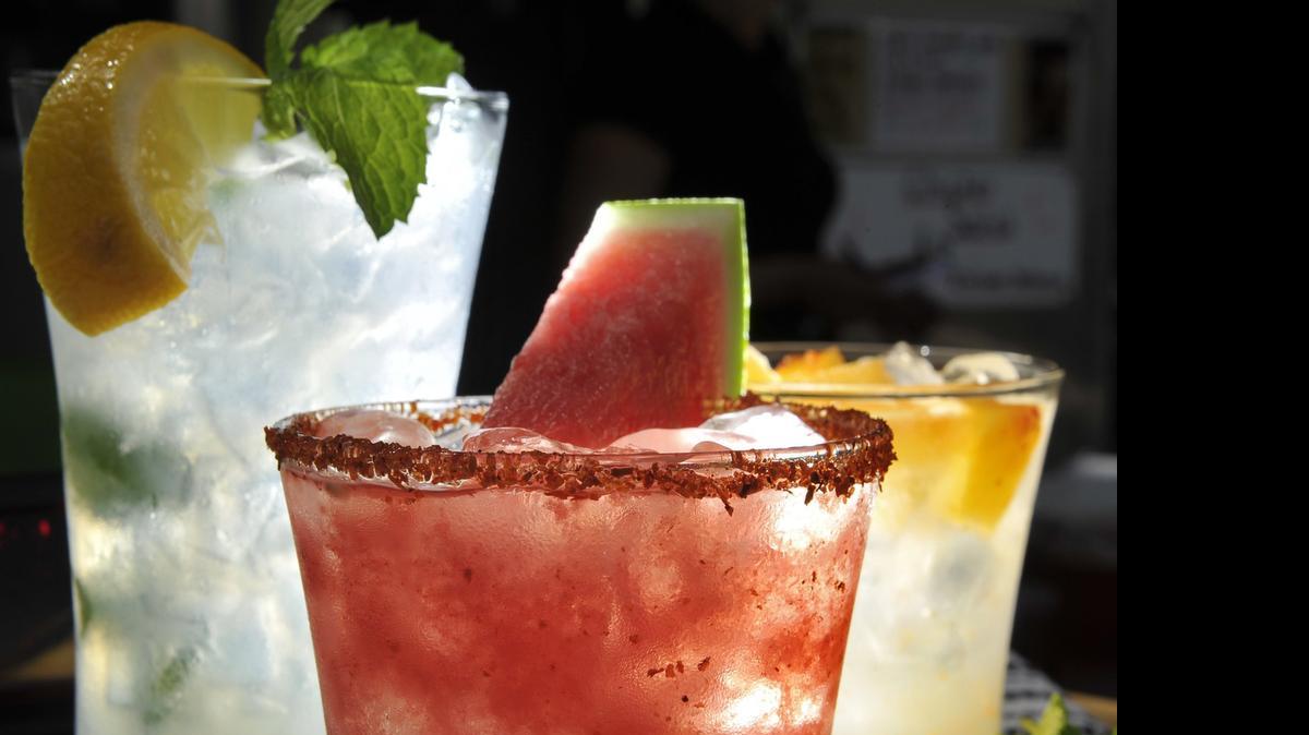 
Aguas frescas mix refreshing flavors like minty lemonade, left, watermelon with chili powder, center, and pineapple-chipotle.

