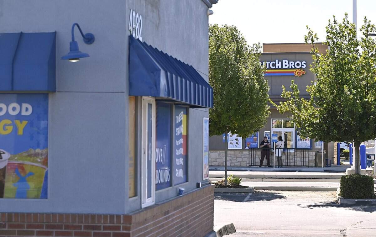 Two Dutch Bros are located 150 feet feet apart at the same southwest corner of Ashlan Avenue and the Chestnut Diagonal, seen Thursday, July 9, 2026 in Fresno. The smaller one to the left is closed and had a single drive-thru lane while the second is new and bigger with two drive-thru lanes.