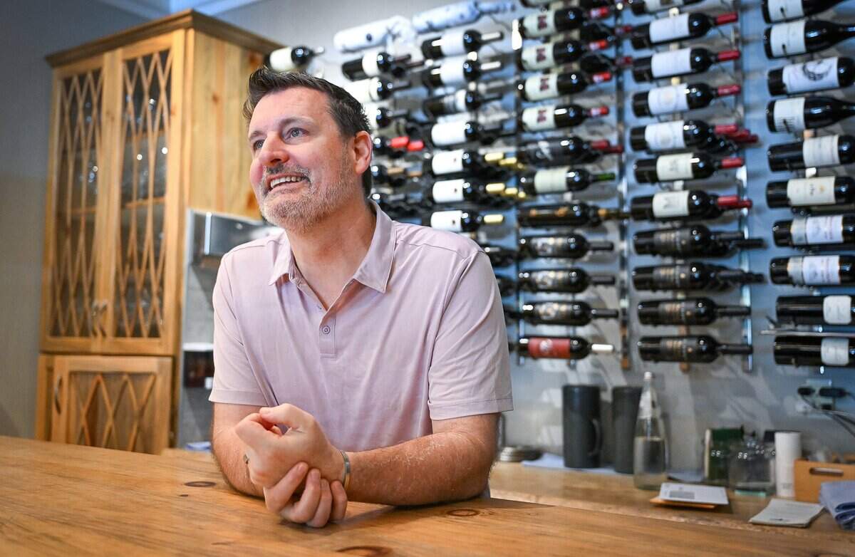 Chris Shackelford, owner of Trelio in Old Town Clovis, stand at the wine bar of the restaurant on Monday, June 1, 2026. The boutique restaurant is celebrating 20 years in business.
