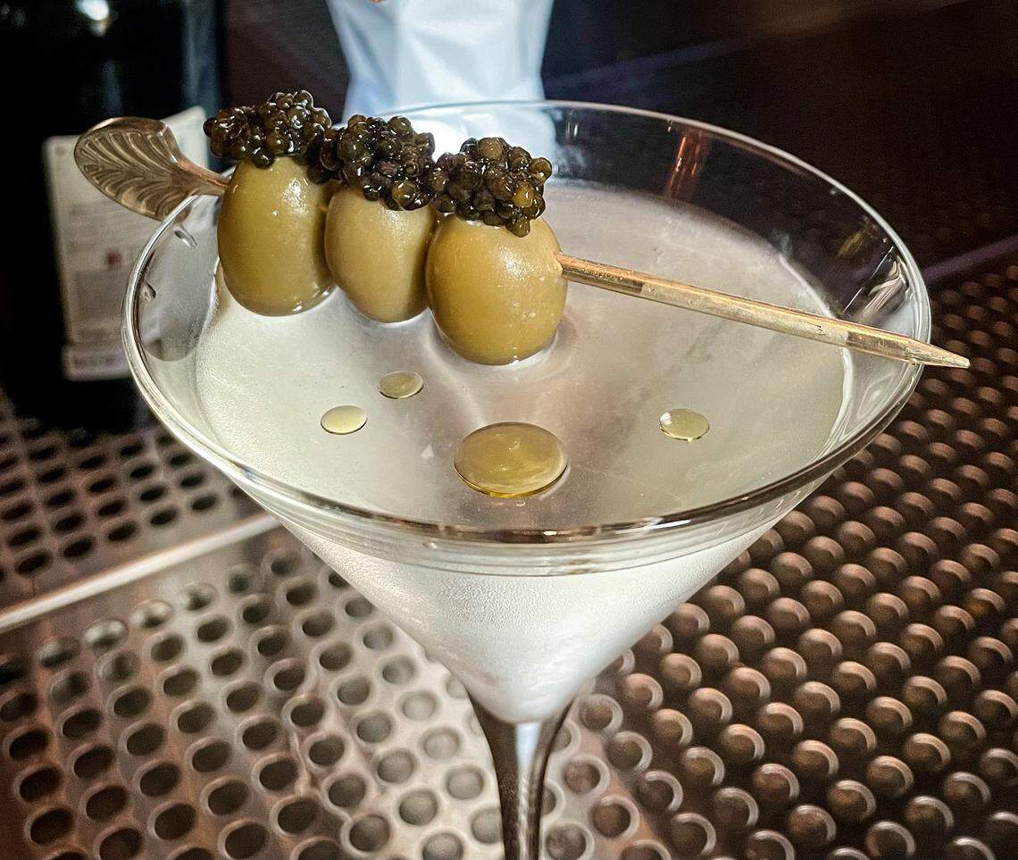 A Bulle signature martini with caviar is shown in a submitted  photo from the restaurant. It features Belvedere 10, Mare gin, Silvio Blanco vermouth and olive oil float. 