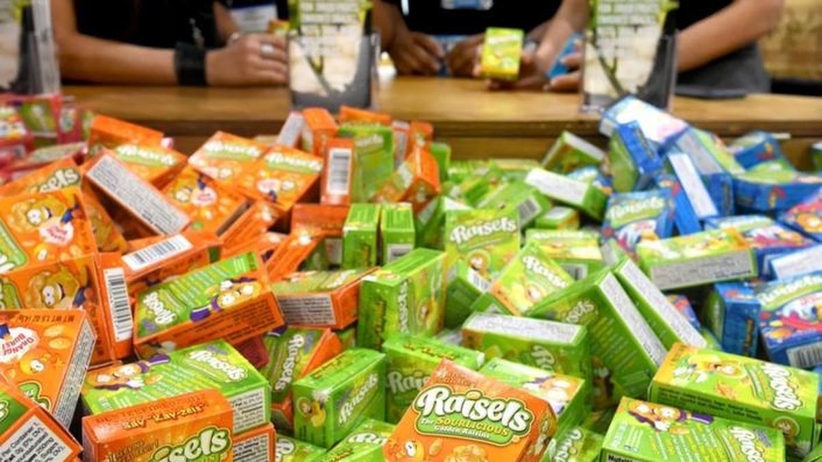 A bin full of National Raisin Company of Fowler’s Raisels, at the company’s booth during the Fresno Food Expo.