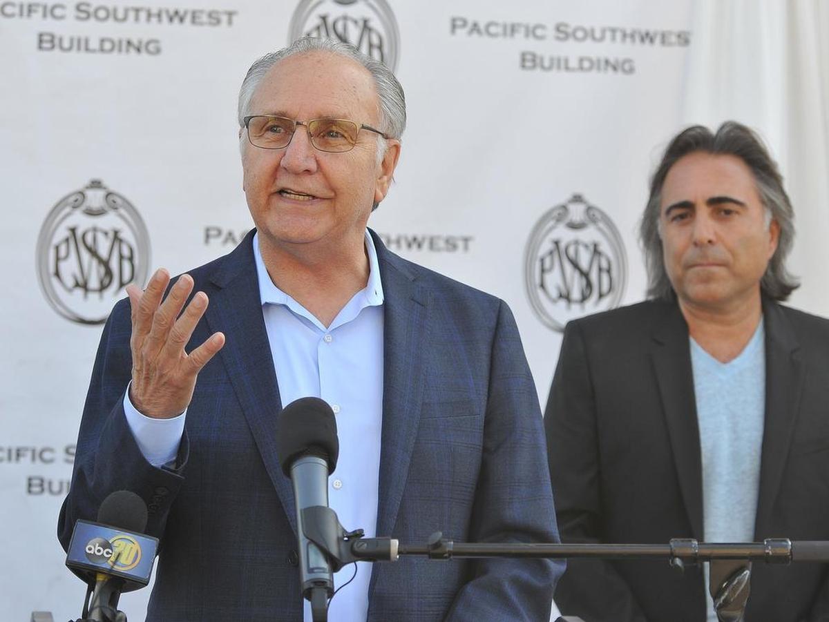 Fresno Mayor Lee Brand makes the announcement Tuesday morning of the opening of the popular La Boulangerie, French bakery and cafe, to the historic Pacific Southwest Building, Sept. 25, 2018, with the buildingâ€™s ownerSevak Khatchadourian, at right.