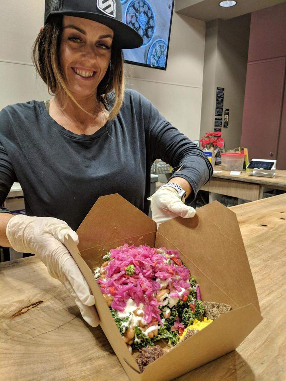 The beans and greens, cooked Peruvian beans on top of a kale Caesar salad, is a top seller at Raw Fresno. The restaurant inside the Galleria at Civic Center Square is open until 7 p.m. weeknights.
