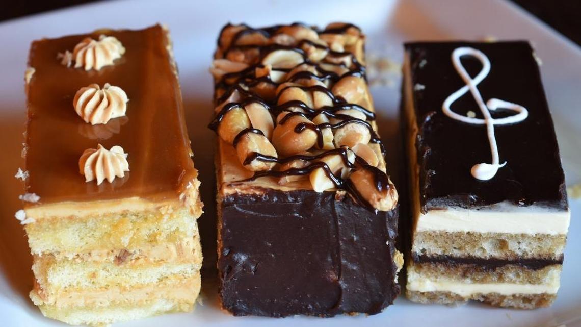 Cakes at Noah’s Ark Restaurant & Bakery, from left, Caramel and Nuts, Snickers and Opera.