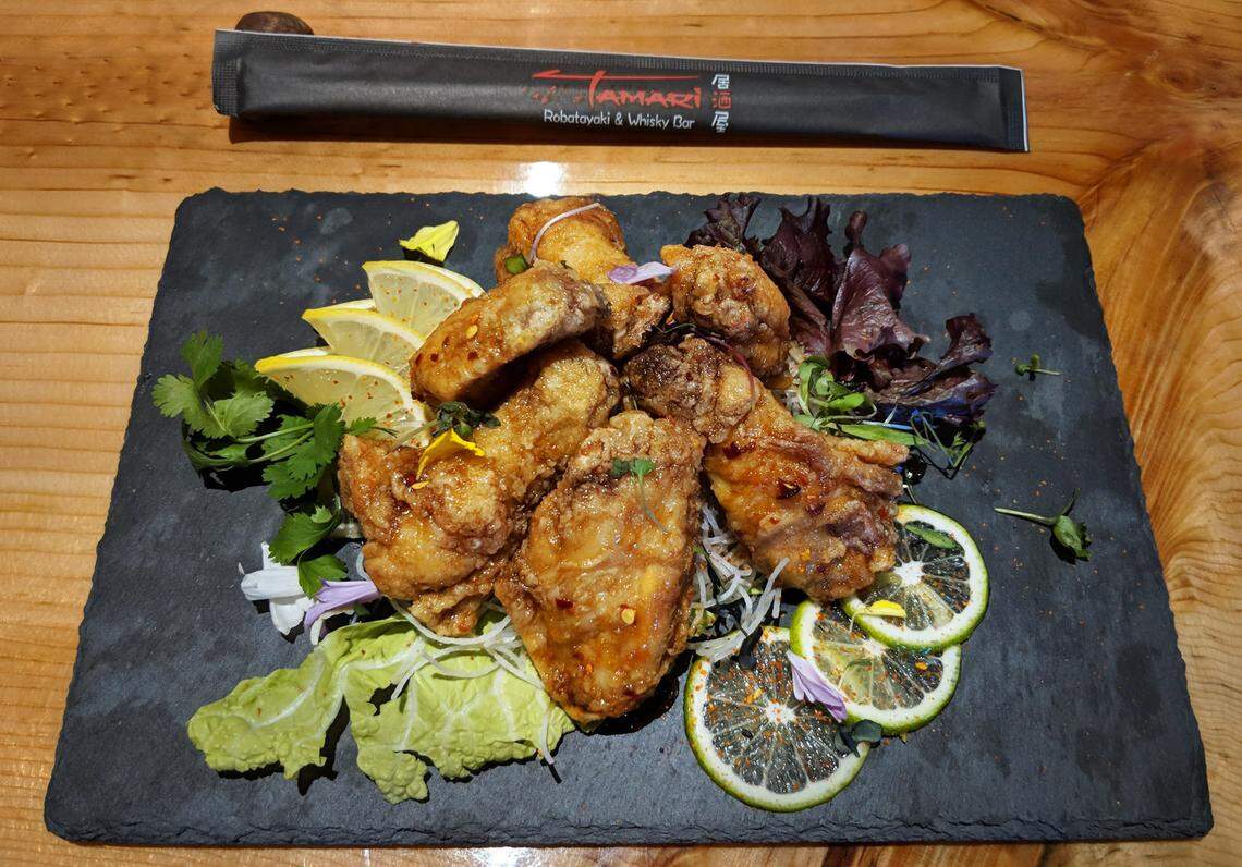 The spicy chicken wings at Tamari Robatayaki & Whisky Bar are deep fried and then basted in a teriyaki sauce.