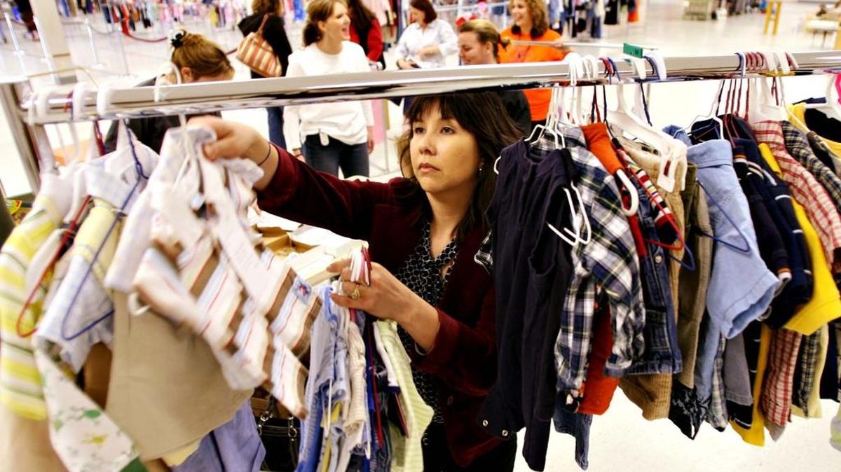 Francis Hawes volunteers sorting clothing at the Just Between Friends Consignment Sale at the Sequoia Mall in Visalia, in 2007. Another sale will be held in Fresno April 14-16 at the Fresno Fairgrounds.
