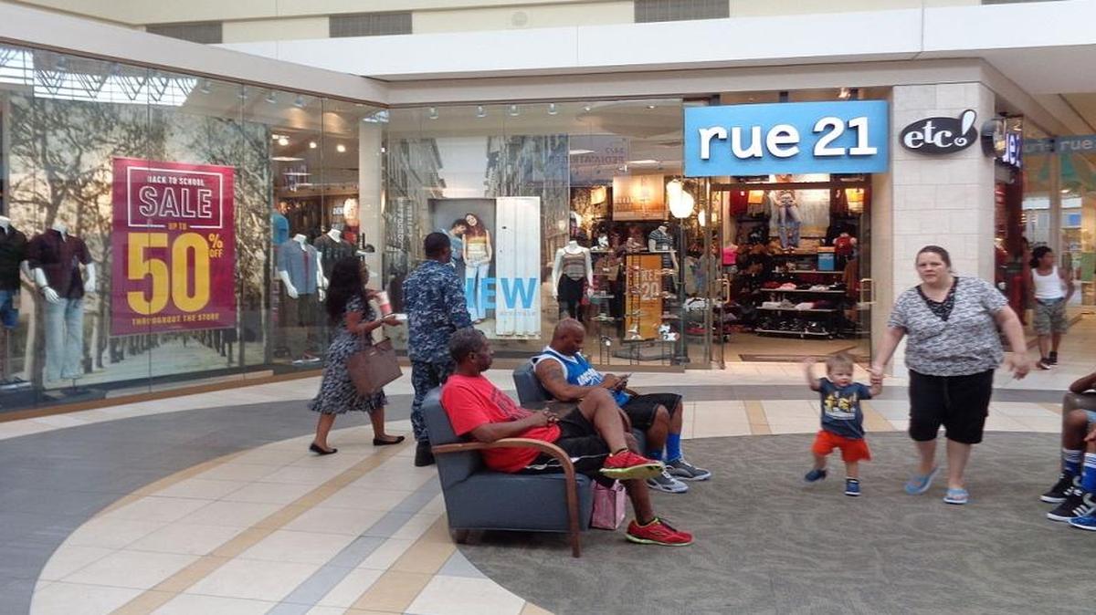 Clothing store Rue 21 is closing 400 stores nationwide, including stores in Clovis and Hanford. Here, shoppers wait outside a store in Orange Park, Florida.