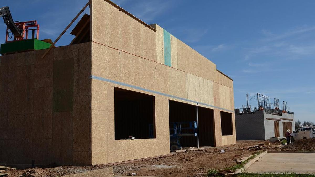 Trader Joe’s, left, and Petco are under construction at Park Crossing at Friant Avenue and Fresno Street on Thursday, March 2, 2017, in north Fresno.