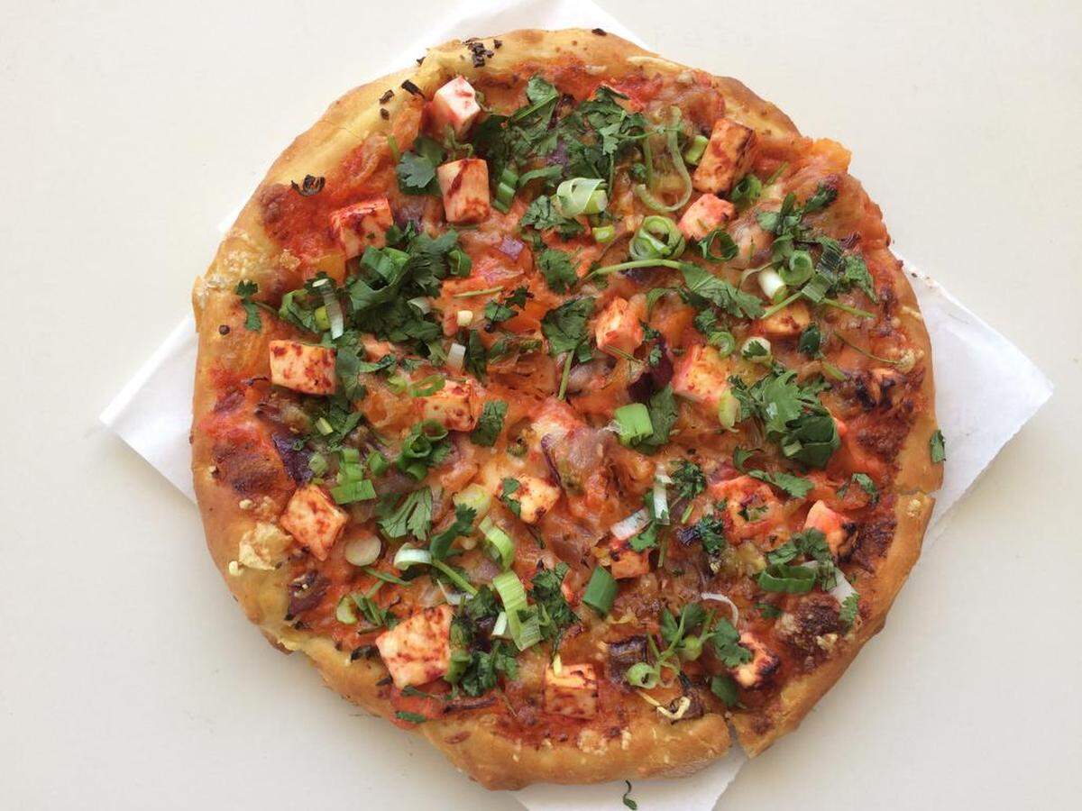 This tandoori paneer pizza is on the menu at European Pizza at Ashlan and Willow avenues.