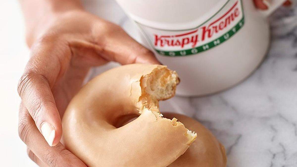 Krispy Kreme is giving away free coffee on National Coffee Day, including its new original glazed coffee, which is essentially glazed doughnut-flavored coffee.