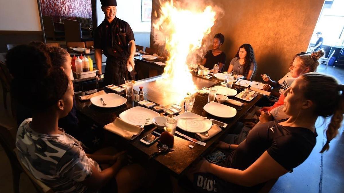 Barry Sayachack prepares a teppanyaki lunch for the Fresno State women’s basketball team at Hino Oishi at Campus Pointe in this Fresno Bee file photo from 2016. Hino Oishi won an award for best Japanese restaurant from the California Restaurant Association.