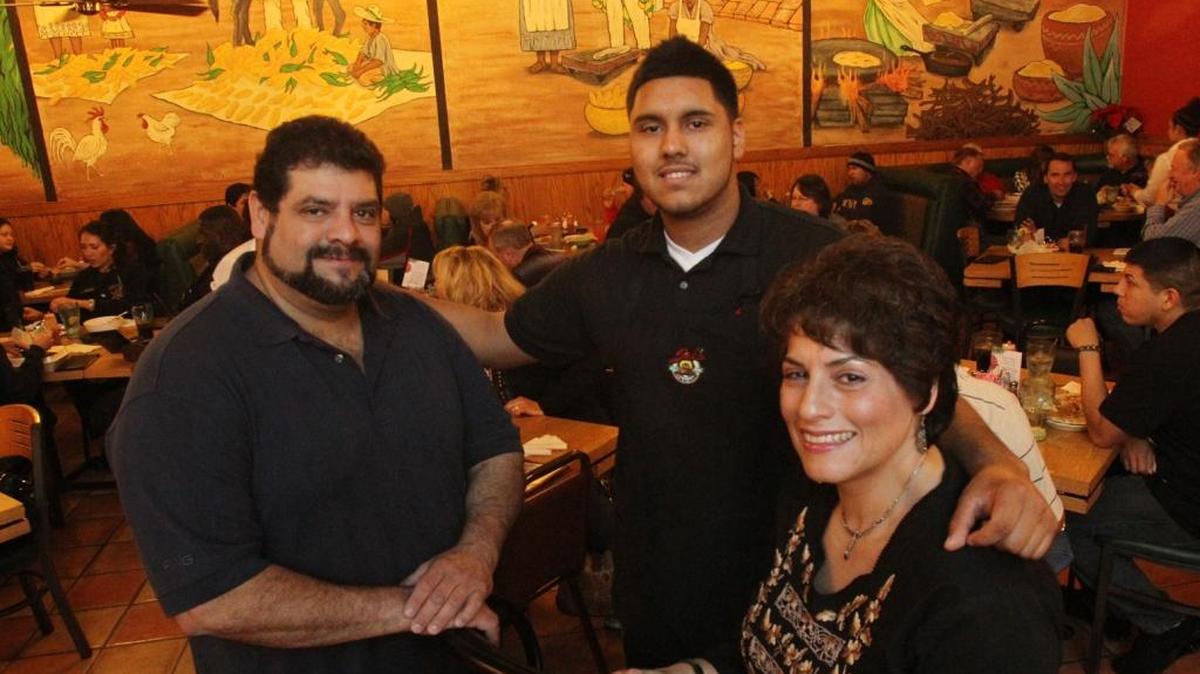 Lorraine Salazar, at right, and Karl Salazar, far left, are owners of Sal’s Mexican Restaurant in this file photo taken in 2010. At center is the restaurant’s namesake Sal Salazar, Karl’s 18-year-old son.