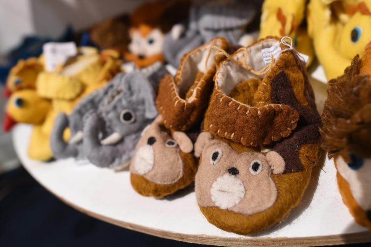 Zooties, children’s slippers handmade by villagers in Kyrgzstan, offered at the Tagua Fair Trade nonprofit store in Fig Garden Village.