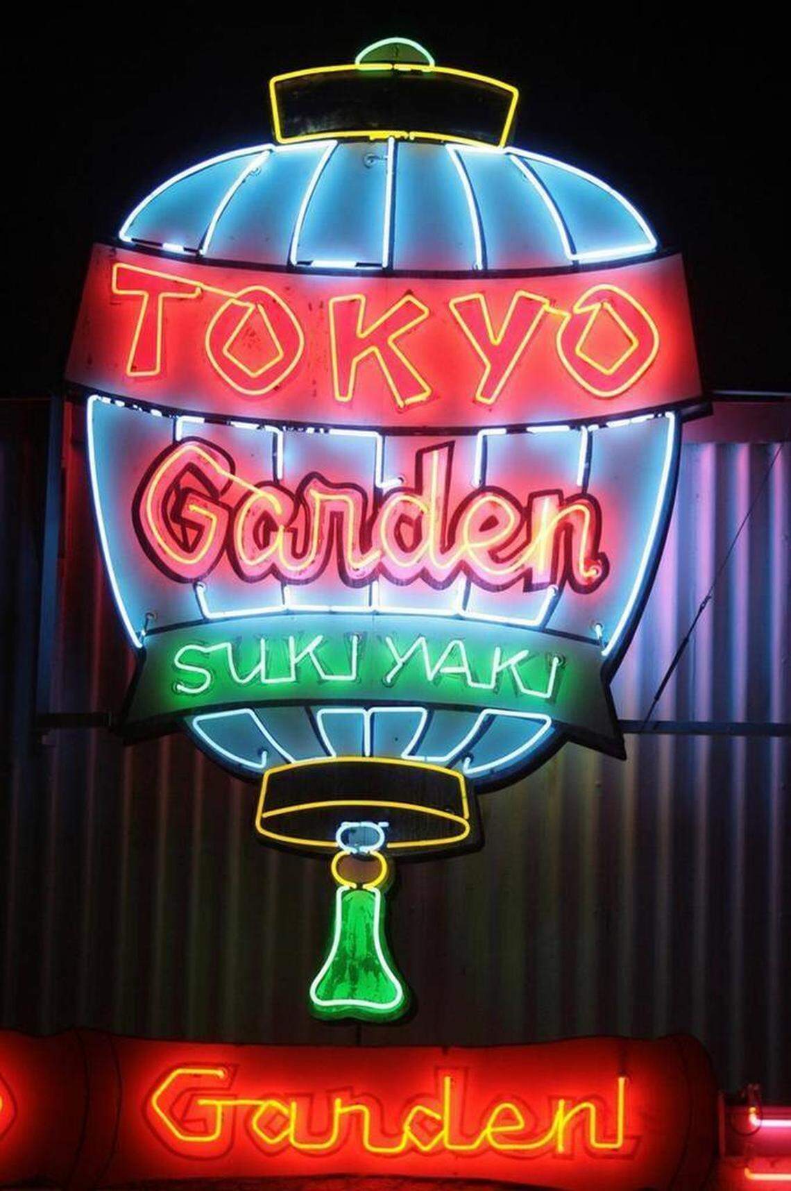 The 1950s-era neon sign in a lantern motif sits atop the Tokyo Garden bar and restaurant at 1711 Fulton St. in downtown Fresno. The business and the building is for sale. 