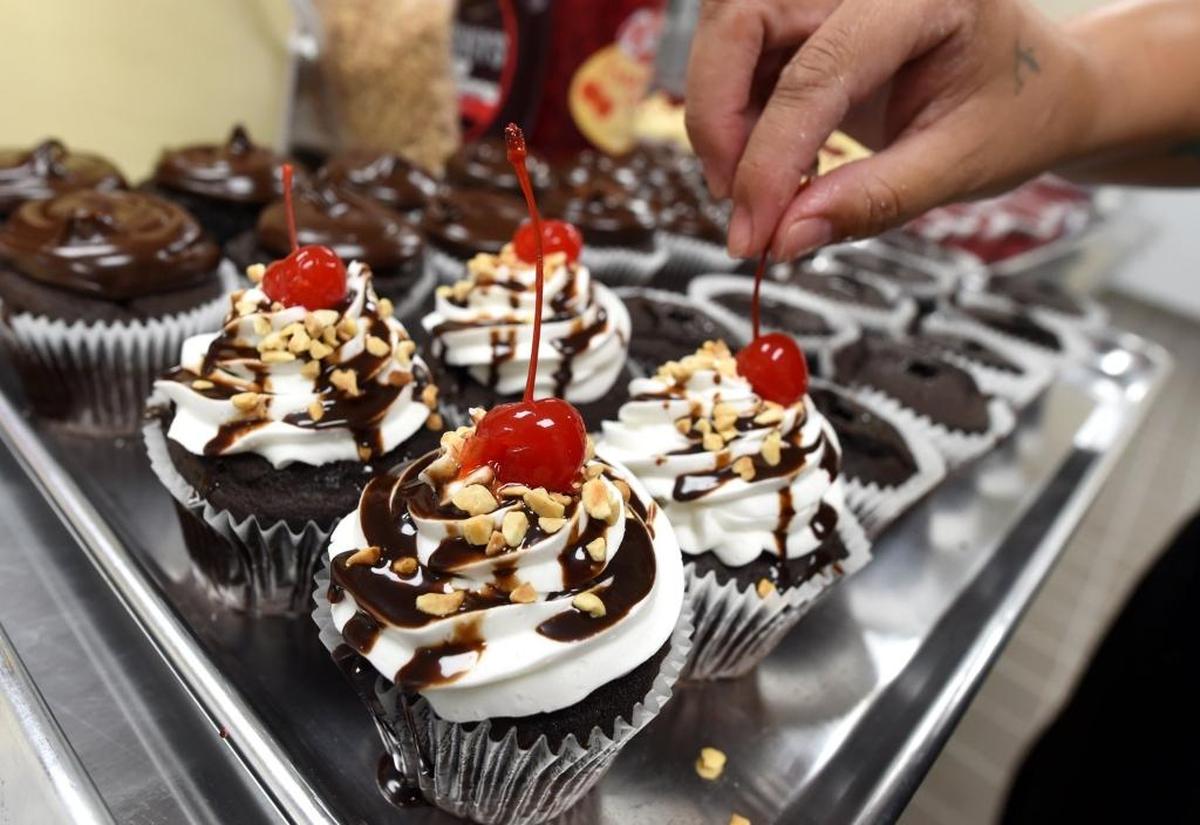 Hot Fudge Sundae cupcakes with cherries on top, courtesy of Smallcakes’ Leticia Riley.
