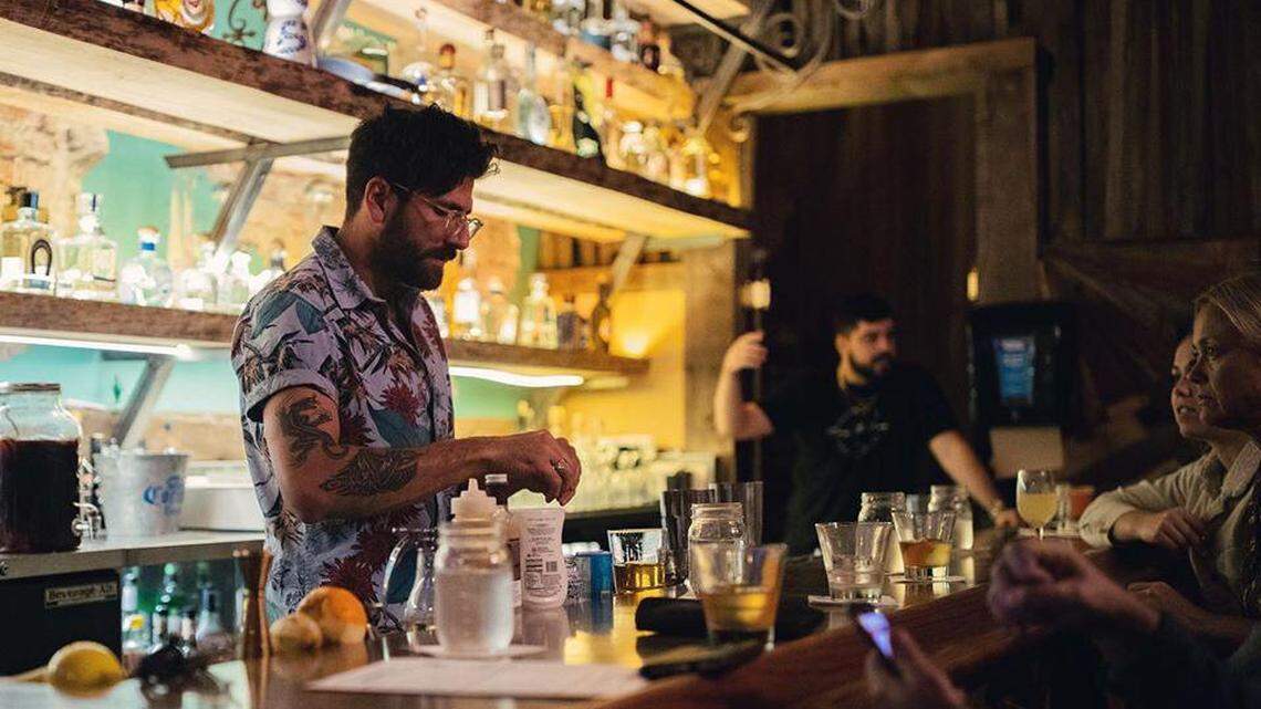 Josh Islas-Wolf, owner of future rooftop bar Quail State in downtown Fresno’s Pacific Southwest Building, works behind the bar at Los Panchos Mexican Restaurant on Fulton Street. Quail State is doing a “residency” at Los Panchos, taking over the bar on weekends while it continues to work on opening Quail State in its original location.