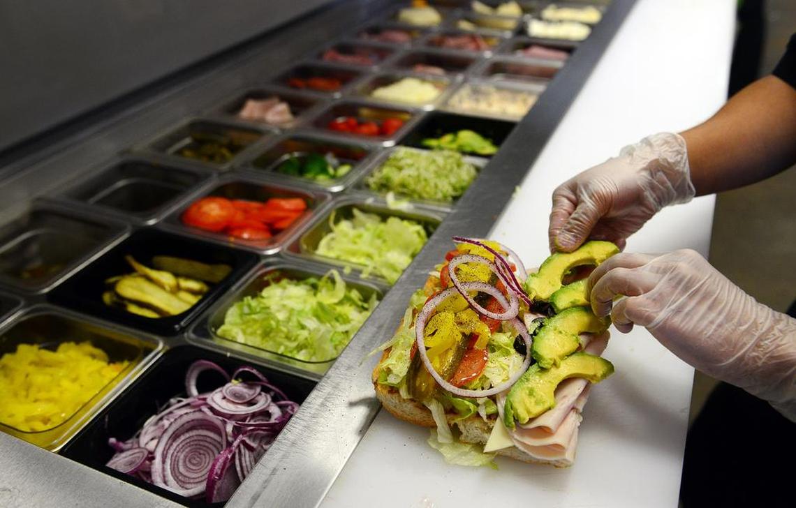 A worker prepares a sandwich at Deli Delicious in Fresno Friday, July 11, 2014. The restaurant at 970 N St. is open until 6 p.m. Mondays through Fridays.