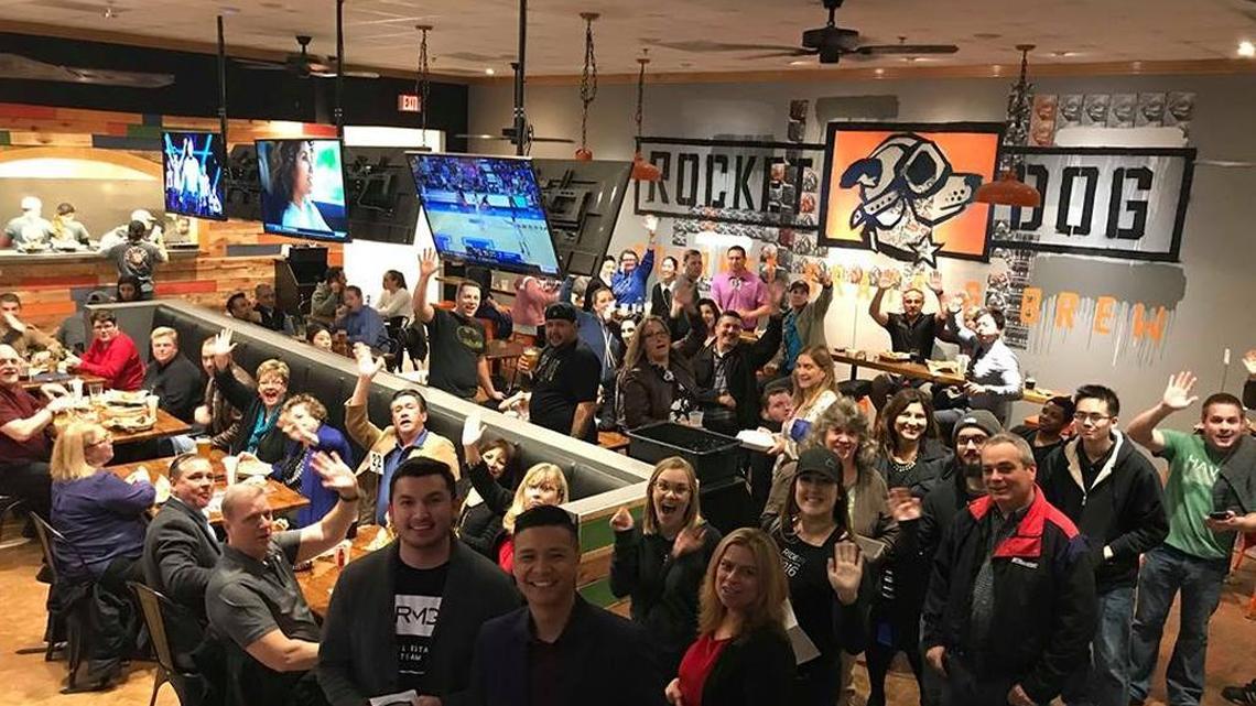 People celebrate the opening of the Clovis Rocket Dog Gourmet Brats & Brew in this photo from 2018. The locally owned restaurant was known for its sausages piled high with toppings and its craft beer. But it could not overcome the dining room closure brought about by the coronavirus pandemic. So the eatery closed in October.