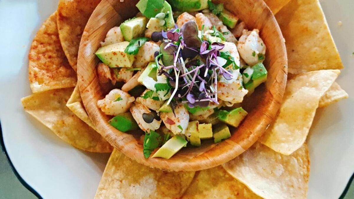 The shrimp ceviche with fresh avocado is served at South Gate Brewing Co. The Oakhurst brewery is expanding and will beef up its menu.