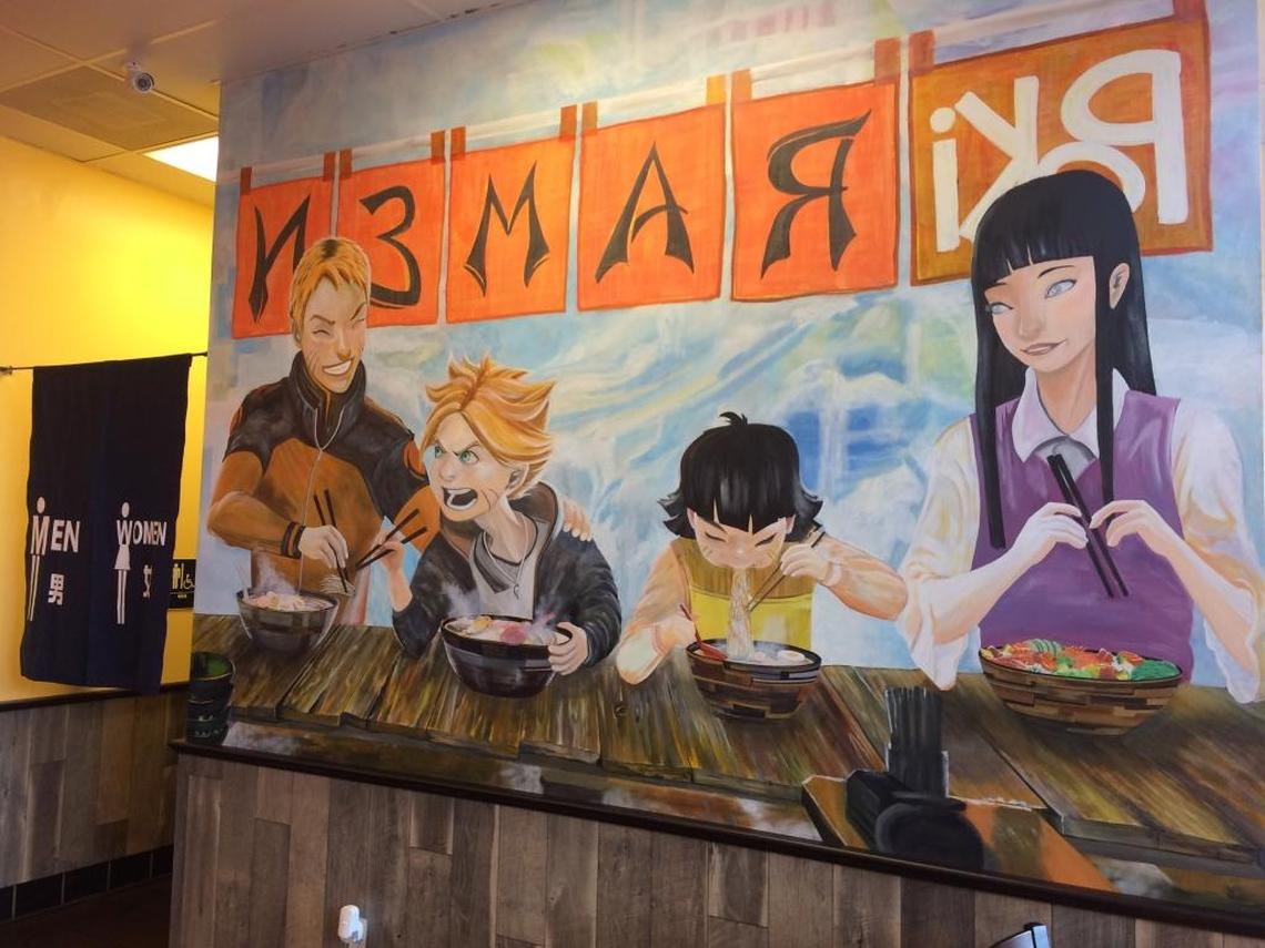 Young people are taking pictures with the mural at newly opened Ichiban Ramen & Poki. Painted by Sak Singharath, the mural features Naruto, an anime character from a Japanese manga series.