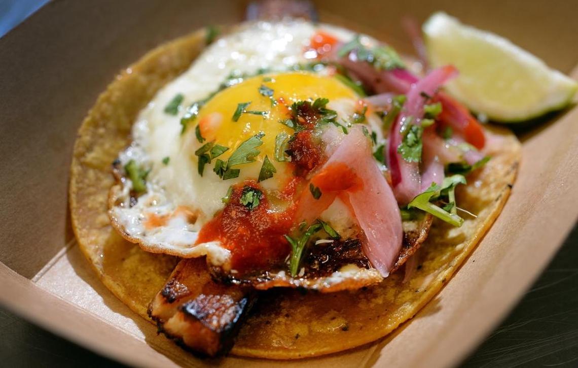 A ranchero taco with braised pork belly and a Pitman Farms fried egg on top at Taste Kitchen in the Sunnyside area of Fresno on Wednesday, Jan. 17, 2018