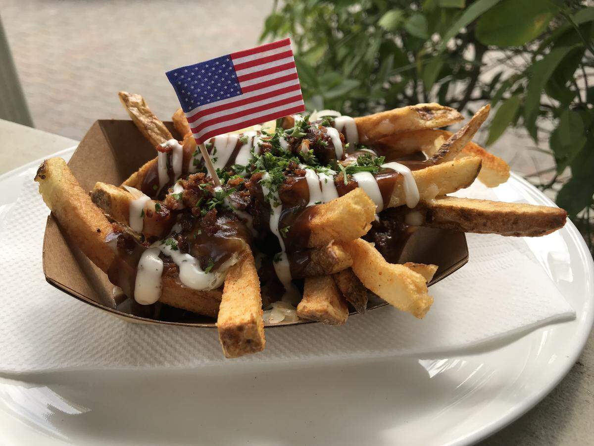 The freedom fries at 356 Tavern & Grill are french fries covered in gravy, bacon, sour cream and cheese.