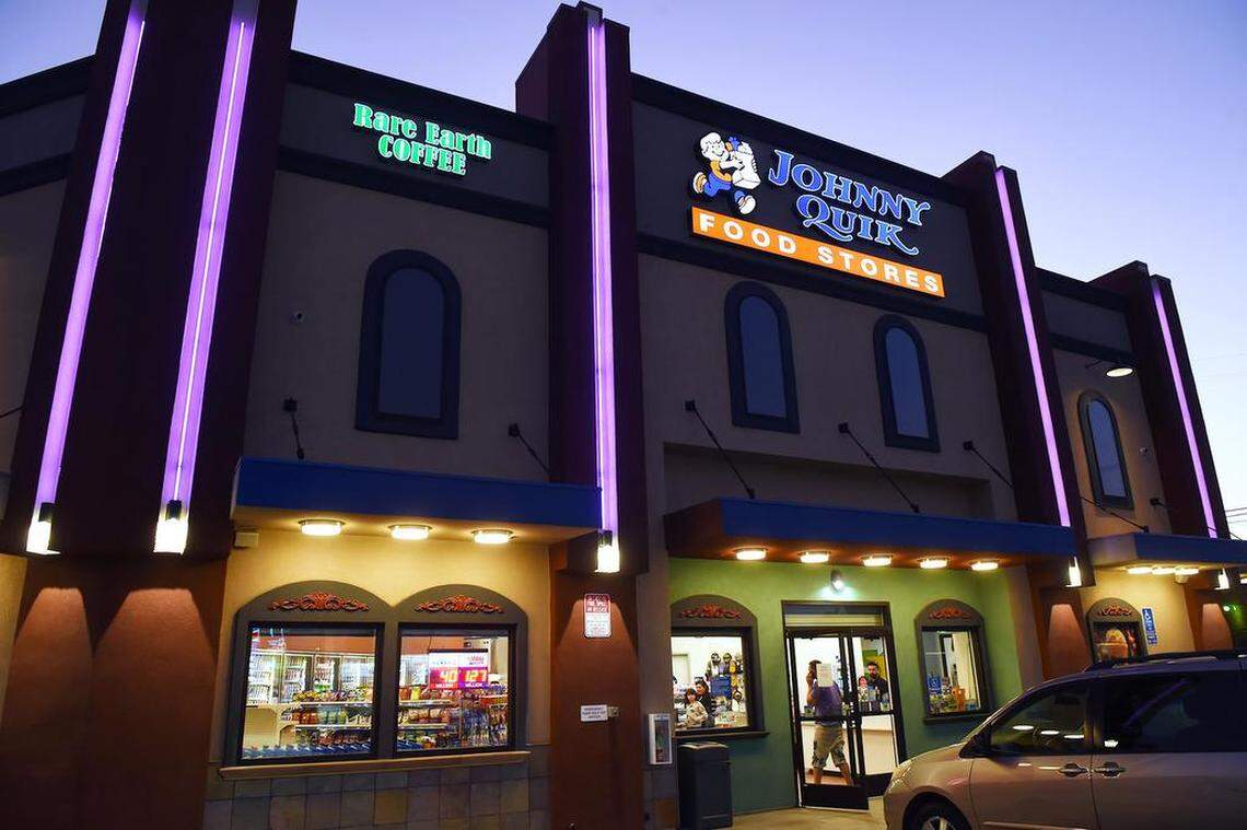 Neon glows at the new Johnny Quik Food Store and Chevron gas station, which also houses a Rare Earth Coffee, and Subway shop, located at Belmont and Van Ness Avenues. Photographed Tuesday, Nov. 5, 2019 in Fresno.