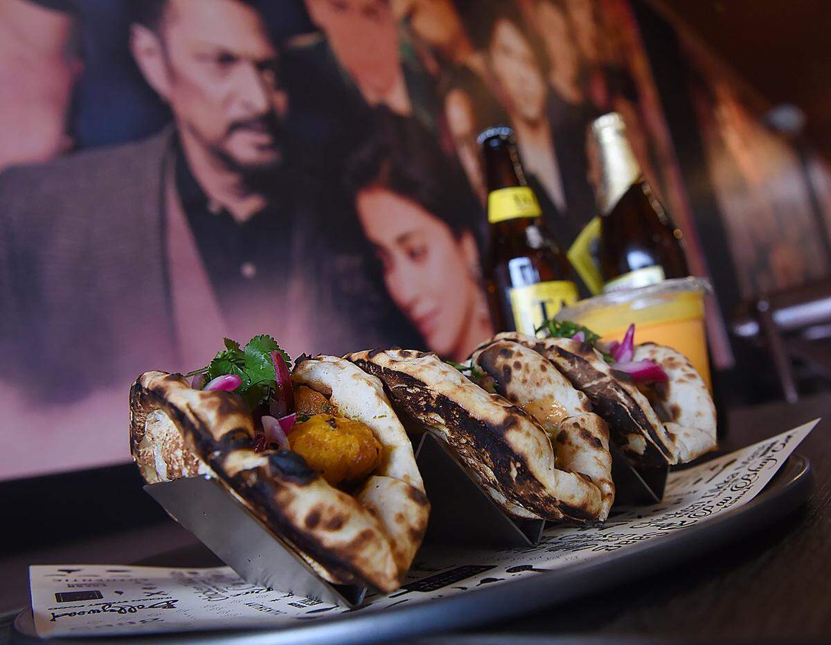 Chicken Tikka tacos, served with Indian beer or mango lassi, shown at Bollywood Indian Street Food on Wednesday, Feb. 20, 2019 in Fresno.