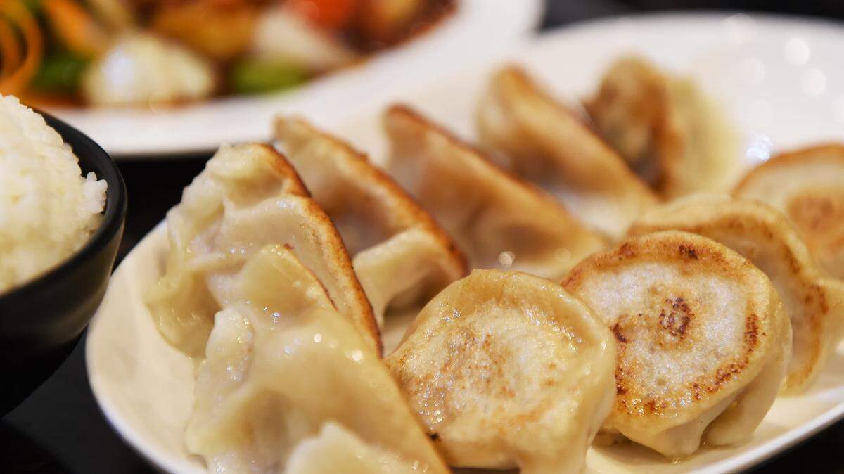Pot stickers ready to be served to a customer at Little Fat Dumplings Thursday, July 12, 2018 in Fresno.