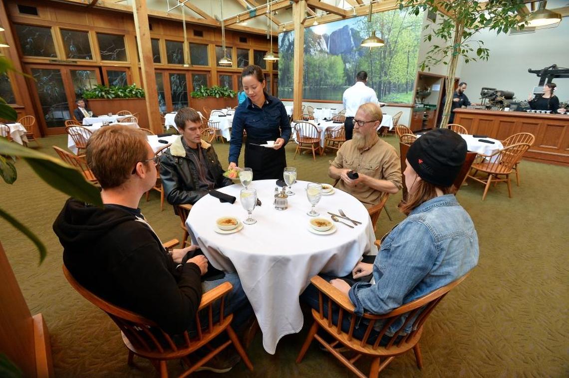 The Downtown Club is open for lunch once again. This photo, taken in 2015 when the restaurant was renamed The Republican, features server Zion Gan, center, Derrick Reimer, 27, left, of Reedley, Rob Walling, 40, second from left, of Fresno, Ian Nance, 35, second from right, of Fresno and Anna Jacobsen, 27, of Fresno.