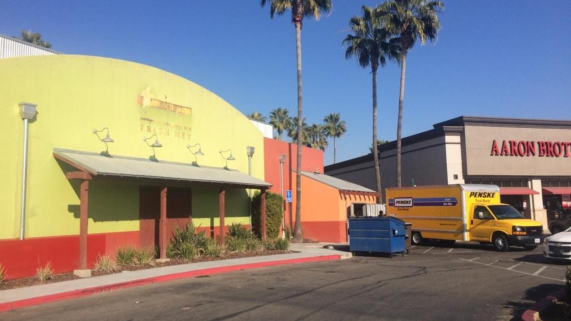 Workers were hauling out contents of the Fresno Chevys Fresh Mex restaurant in River Park on Thursday. The restaurant has closed, one of 14 locations that its parent company is closing.