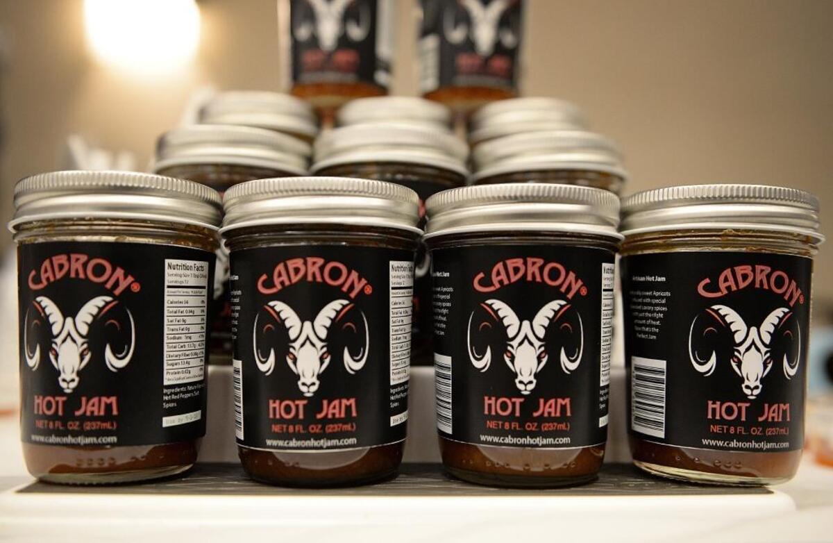 Jars of Cabron Hot Jam are put out among the new products.
