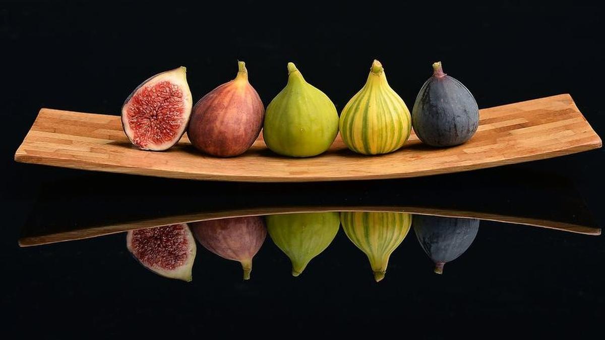 
From left, a sliced Brown Turkey Fig, Brown Turkey Fig, Sierra Fig, Tiger Fig and Black Mission Fig. One of the oldest fruits to be harvested in the San Joaquin Valley, figs remain in demand by chefs, home cooks and food manufacturers. They are sought after for their texture, color and sweetness.
